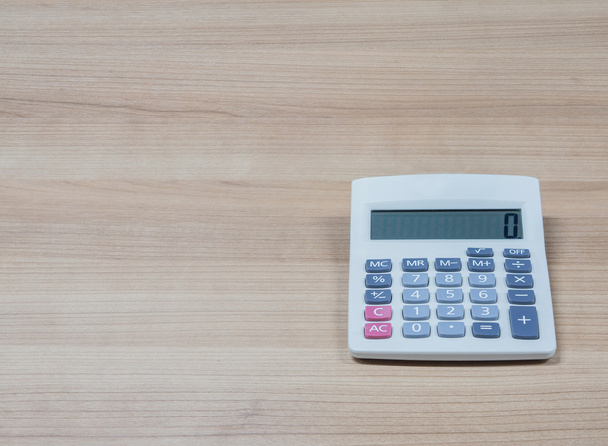 Calculadora en el escritorio
 - Foto, Imagen