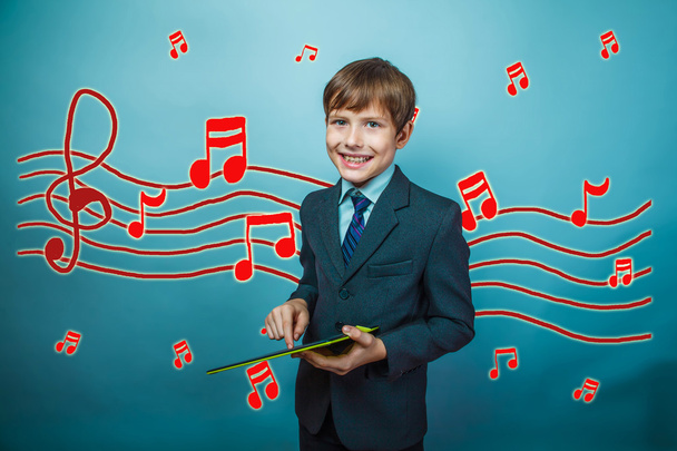 adolescent boy smiling businessman holding a tablet sketch preve - Fotó, kép