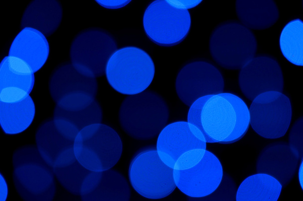 abstract blue bokeh on black background - Фото, изображение