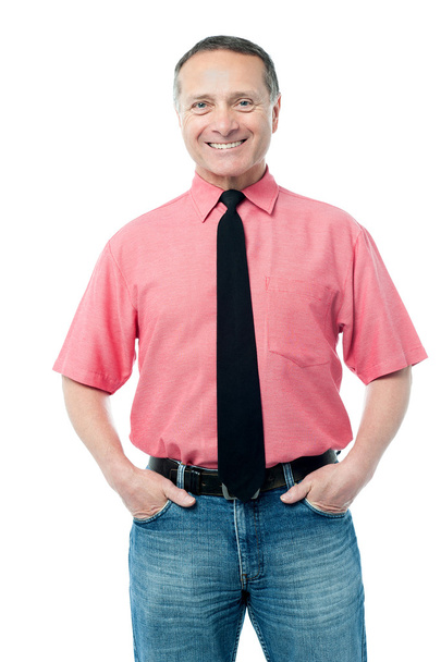 Senior male entrepreneur with hands in pockets - Photo, image