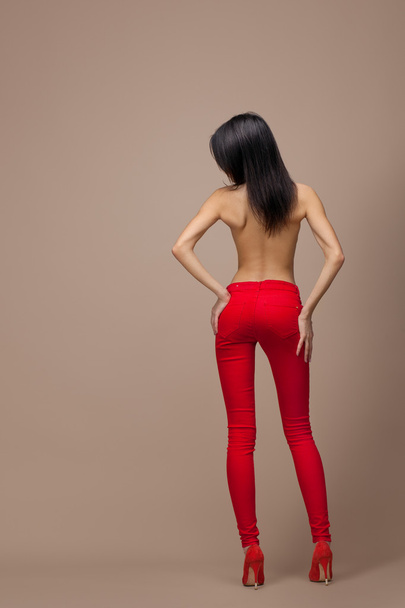The girl in red trousers - Foto, Imagen