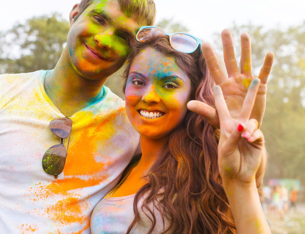 Happy couple in love on holi color festival - Photo, Image