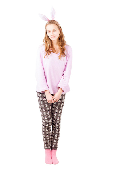 Girl in pink clothes and holiday pants isolated - Фото, изображение