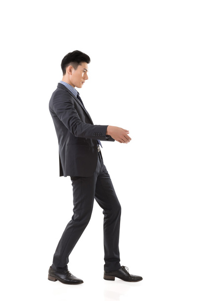 Holding pose of Asian business man - Photo, Image