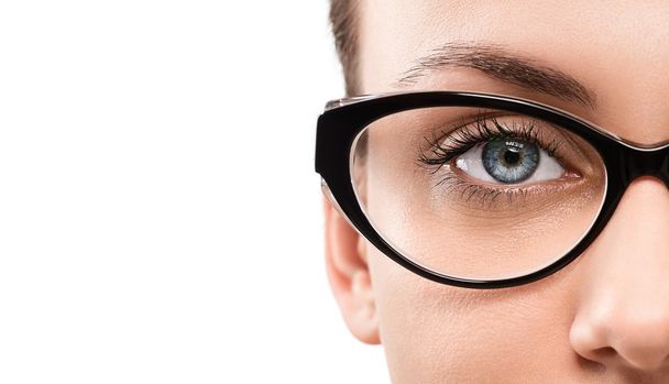 Cloese up of young woman wearing eyeglasses - Foto, Bild