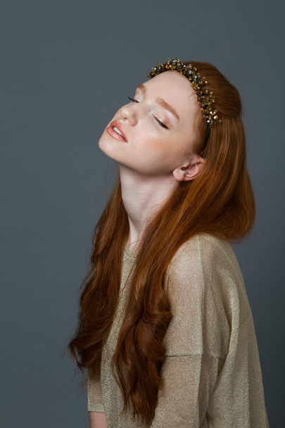 Cute redhead woman with hoop on her head - Photo, Image
