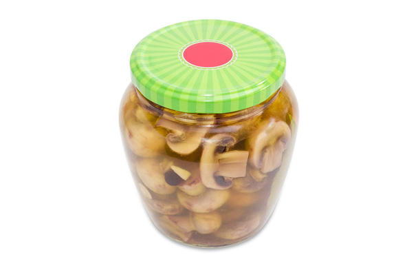 Pickled button mushrooms in glass jar - Fotó, kép
