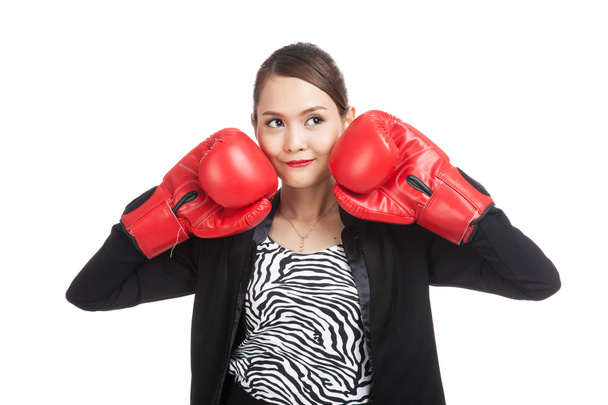 Young Asian business woman with red boxing gloves - Foto, immagini