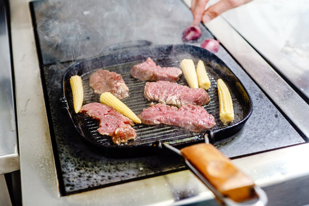 chef making steaks - Foto, immagini