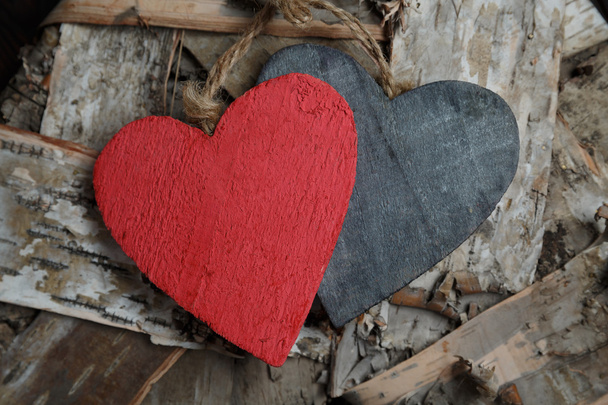Wooden hearts on wood background - Photo, Image
