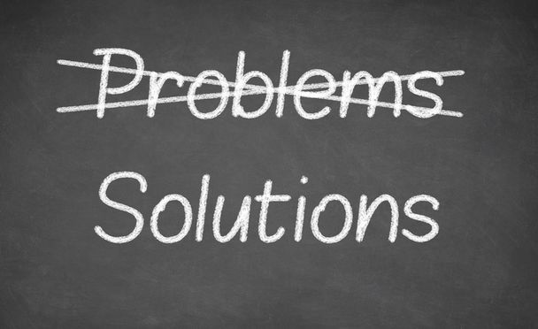 Crossing out problems and writing solutions on a blackboard. - Fotoğraf, Görsel