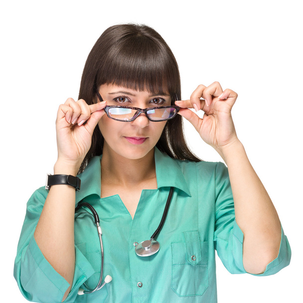 Portrait of a friendly female doctor with stethoscope - Фото, зображення