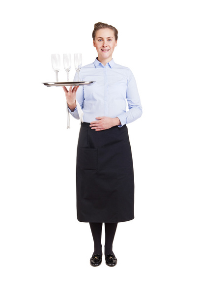 Woman in waiter uniform holding tray with glasses, smiling, isol - Photo, Image