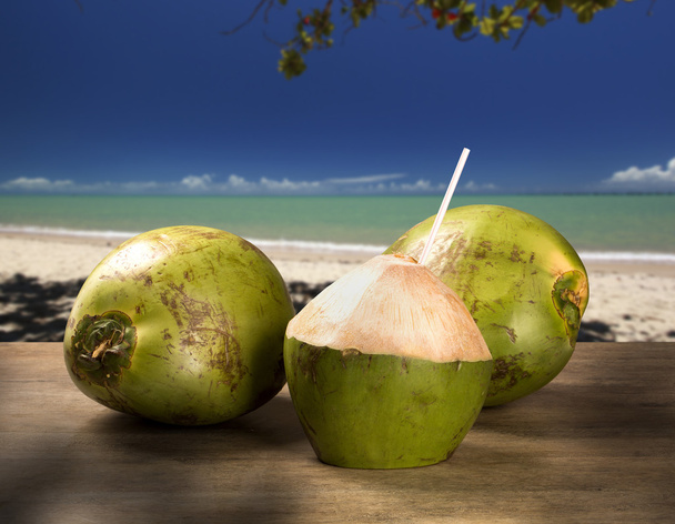 Coconut cocktail on a tropical beach in Brazil. - Фото, изображение