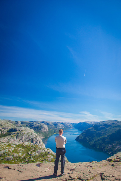 The man on the mountain. Norway, Preacher's Pulpit - Fotó, kép