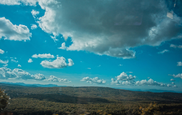 mraky na modré obloze - Fotografie, Obrázek