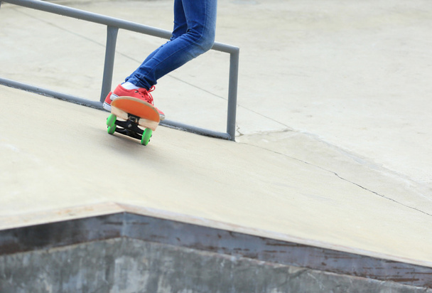 skateboarding legs at skatepark - 写真・画像