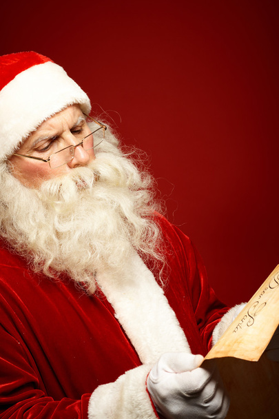 サンタ クロース読書クリスマスの手紙 - 写真・画像