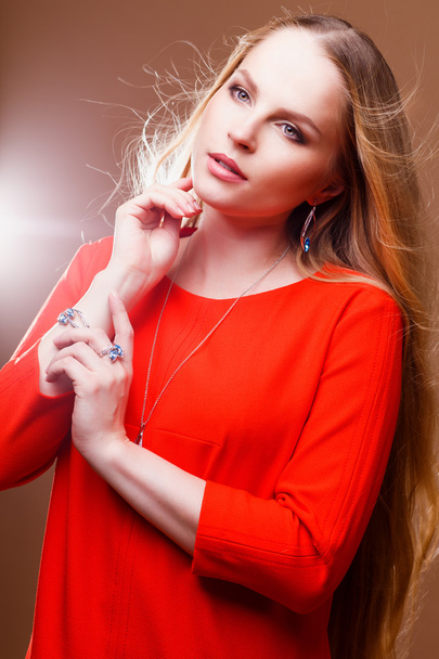 Close-up portrait of beautiful young woman with luxury jewelry and perfect make up. Fashion beauty portrait - 写真・画像