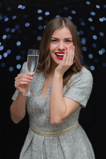 Woman with a glass of champagne - Zdjęcie, obraz