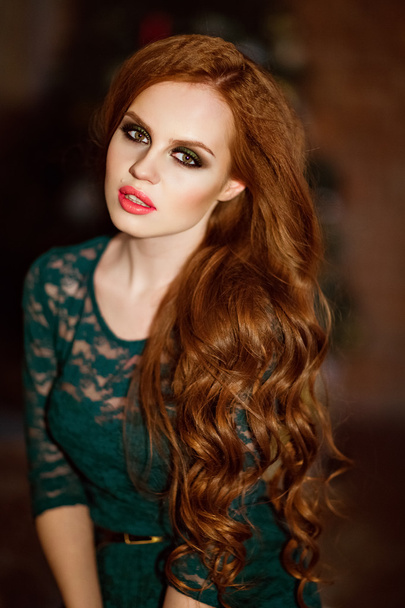 Portrait of red-haired sensual girl with the beautiful makeup in - Photo, image