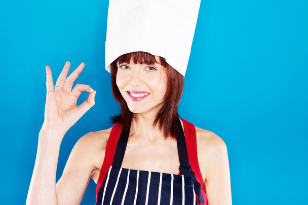 chef-kok geven perfectie gebaar glimlachen - Foto, afbeelding