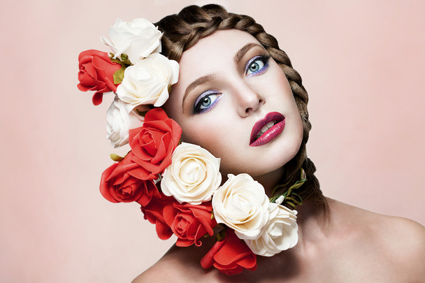 Gorgeous woman with flowers in hair - Zdjęcie, obraz