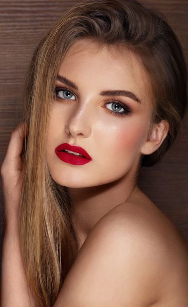 Beautiful young model with red lips - Фото, зображення