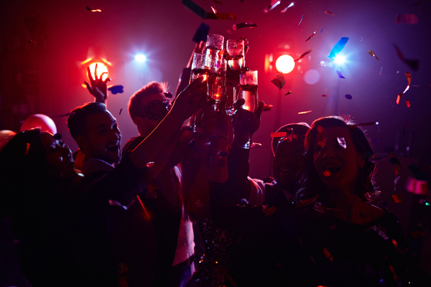 friendly people toasting in night club - Photo, Image