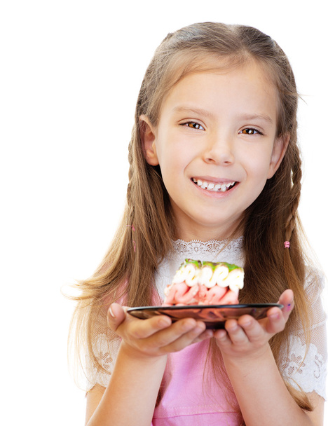 Menina segurando pedaço de bolo
 - Foto, Imagem