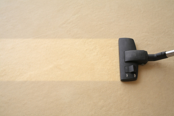 Porszívó tisztítja szőnyeg - Fotó, kép