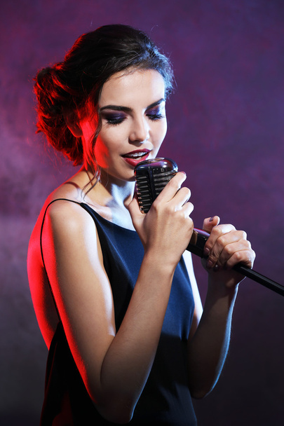 beautiful woman singing - Фото, изображение