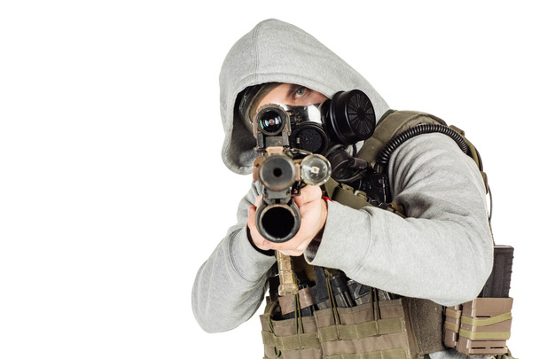 rebel with gas mask and rifles against a white background - Φωτογραφία, εικόνα