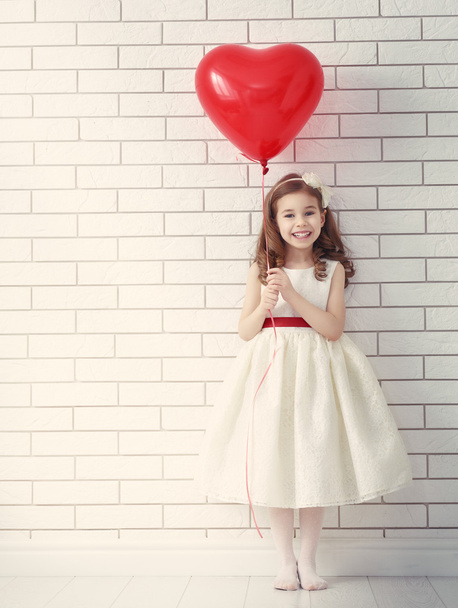 girl with red heart - Zdjęcie, obraz