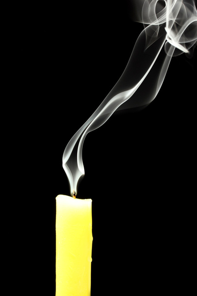 Candle with abstract smoke on black background - Foto, imagen