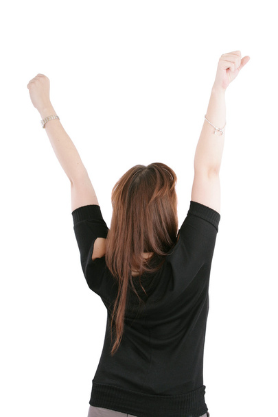 Beautiful happy young woman with her arms in the air. Isolated o - Foto, Bild