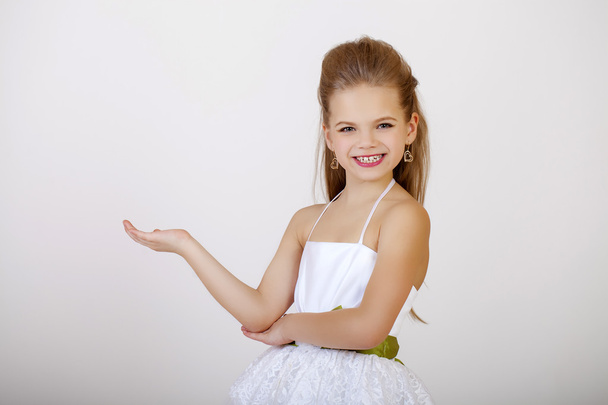 Portrait of a little girl in white classic dress  - Foto, imagen