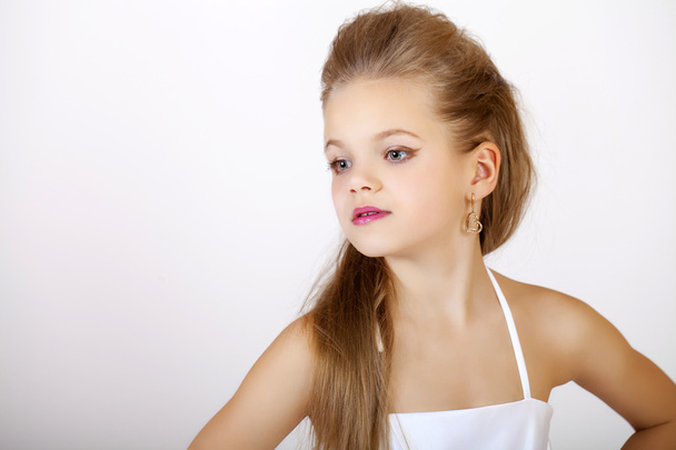 Portrait of a little girl in white classic dress  - Foto, immagini