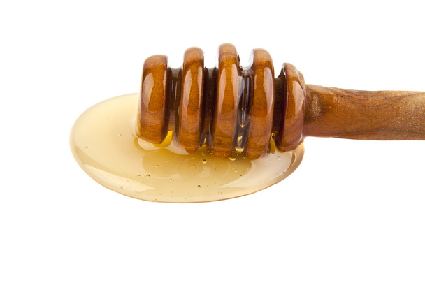 Honey dripping on white - Photo, Image