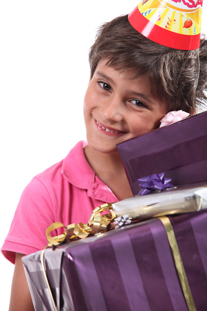 Child with birthday gifts - 写真・画像