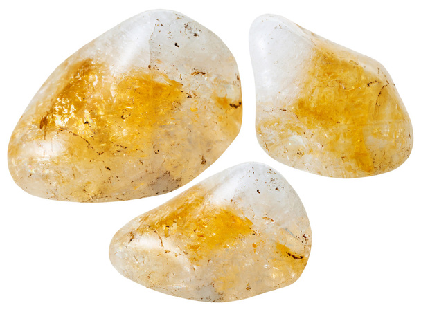 tres piedras preciosas de cuarzo citrino amarillo aisladas
 - Foto, Imagen