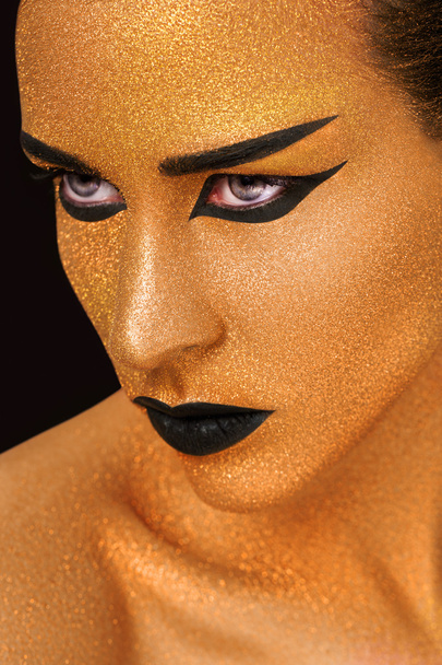 Golden Woman's Face Close up. Futuristic Gilded Make-up. Painted Skin - Φωτογραφία, εικόνα
