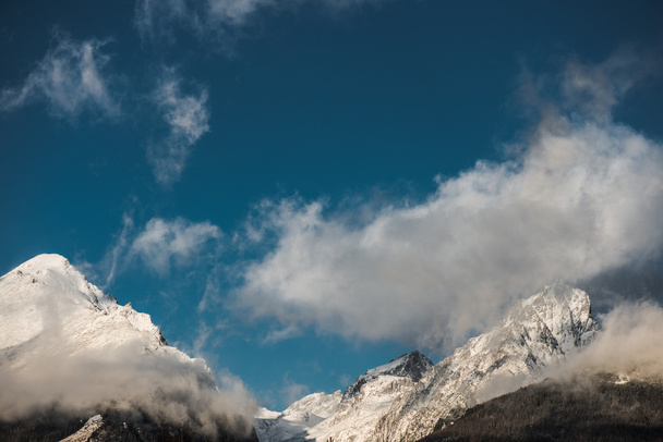 High mountain peak  and blue sky, winter landscape - Photo, Image