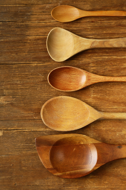 empty wooden spoons on an old grungy background - Фото, зображення