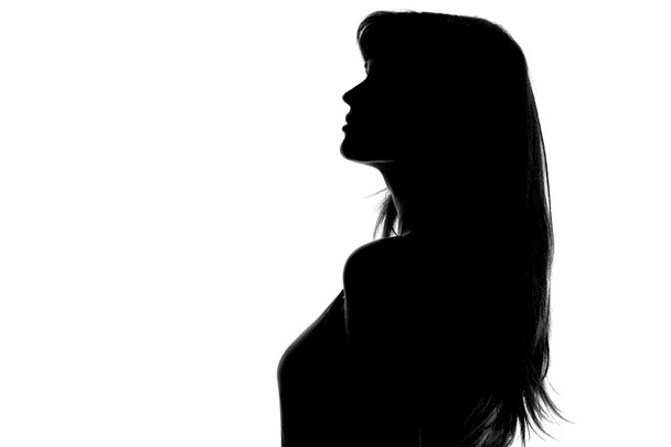 silhouette of a pensive woman on a white background - Photo, Image