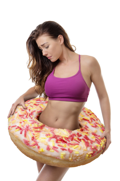 large donut around woman - Foto, Bild