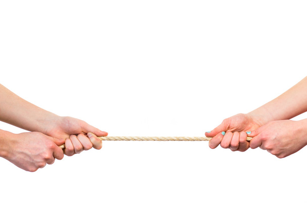 Жіночі руки тягнуть мотузку на білому тлі
 - Фото, зображення