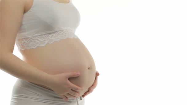 Kobieta w ciąży oddycha głęboko - Materiał filmowy, wideo