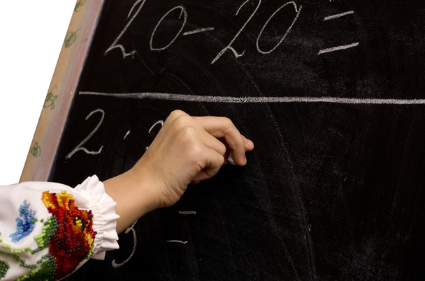 main d'une écolière écrivant sur le tableau
 - Photo, image