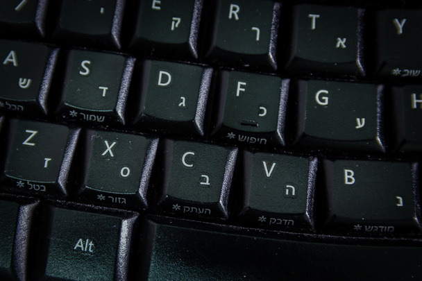 клавіатура з літерами, івритом та англійською мовами - Фото, зображення